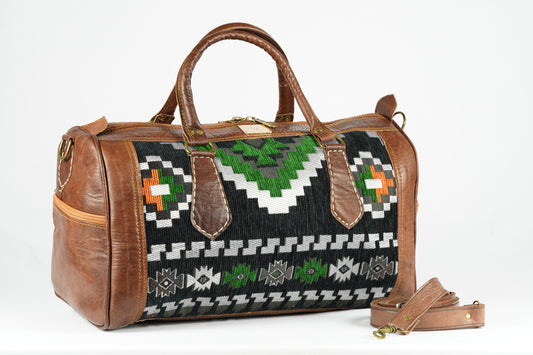 Handgefertigte Reisetasche aus echtem Leder und traditionellem Textilgewebe - morabel