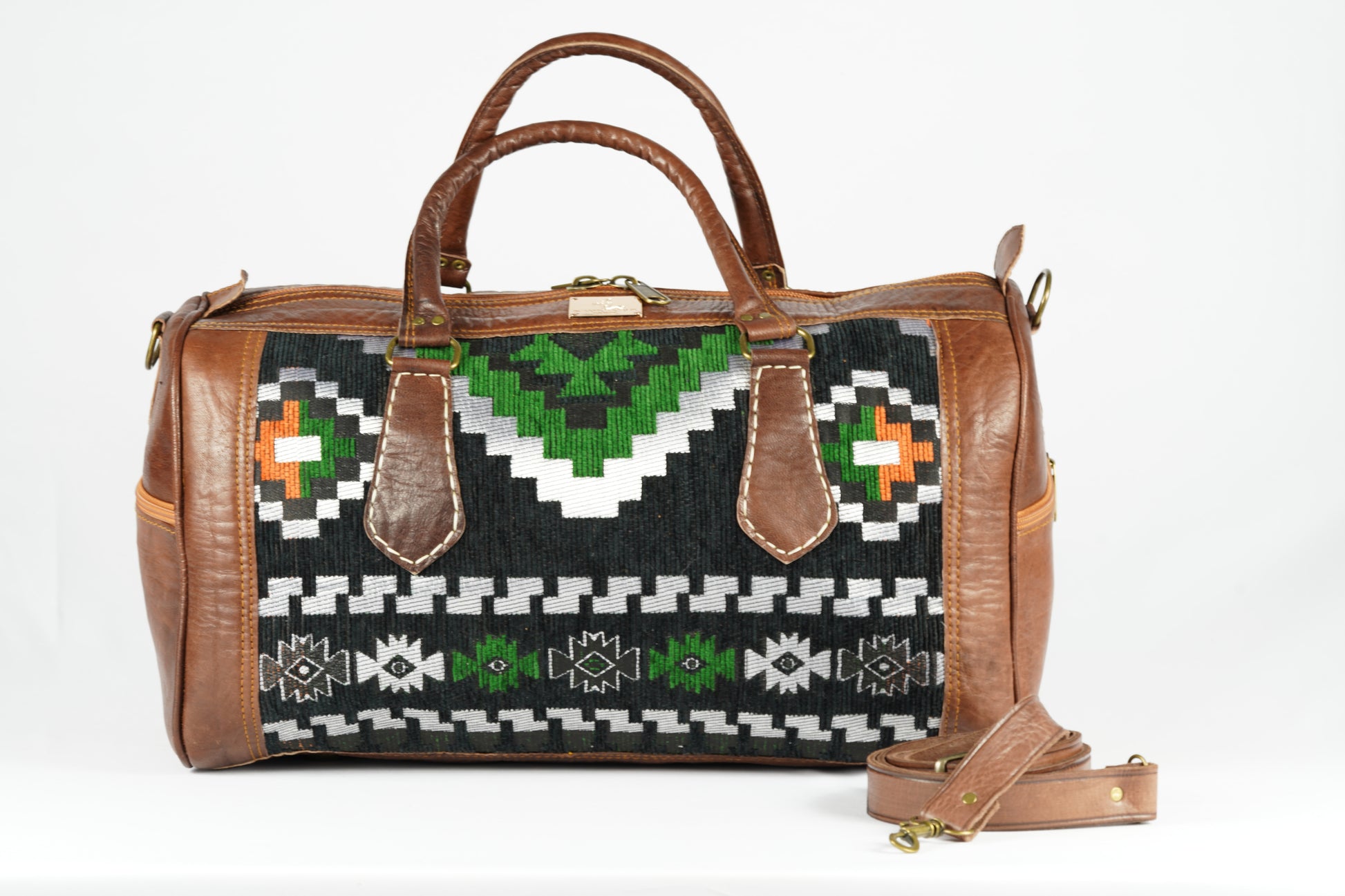 Handgefertigte Reisetasche aus echtem Leder und traditionellem Textilgewebe - morabel