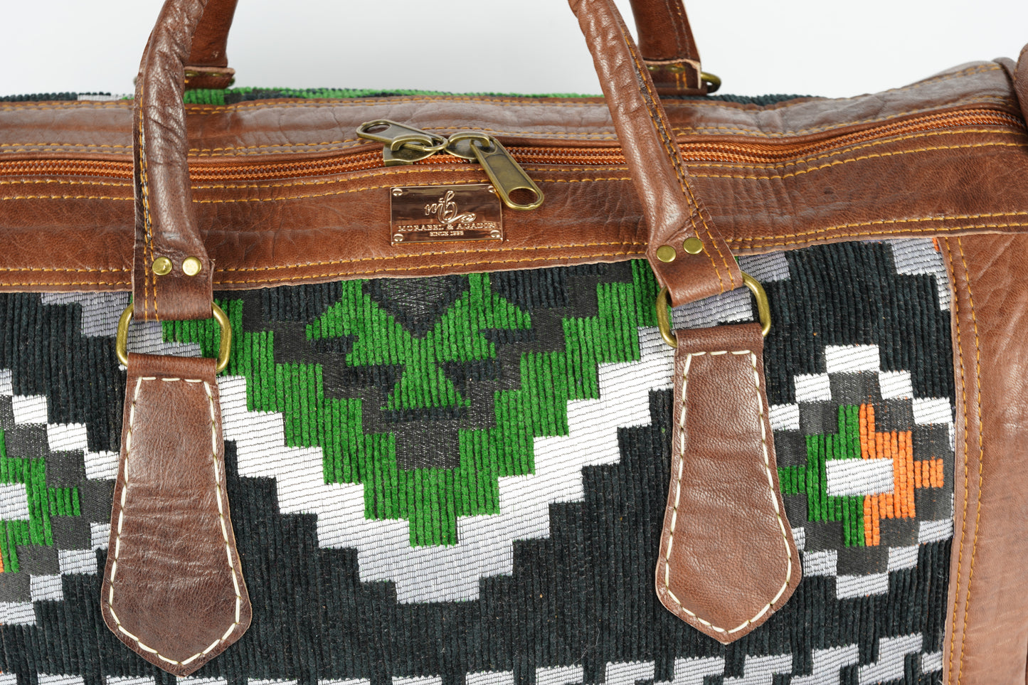 Handgefertigte Reisetasche aus echtem Leder und traditionellem Textilgewebe - morabel